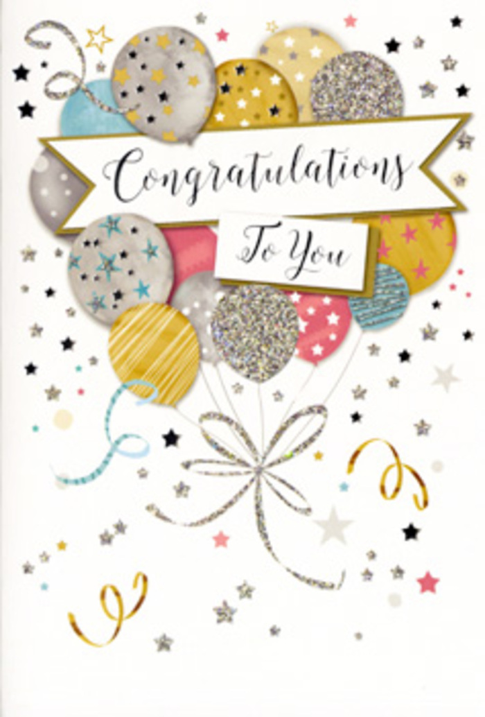 The image showcases a tall congratulations card whose front design centres on a radiant, balloon-filled composition, as polished and joyful as a special gathering in Mill Hill's cafés after someone shares exciting news. A cluster of softly rounded balloons rises from the lower portion of the card, overlapping and fanning out so they resemble a festive bouquet. Their hues are gently luminous: champagne gold, muted silver, dove grey, pastel sky blue and tender blush pink, each balloon adorned with details such as glittering speckles, slim metallic stripes or tiny star patterns. These embellishments suggest a subtle, sparkling sheen, similar to light glinting off shop windows along Mill Hill Broadway in the late afternoon. From the base of the balloons, slender ribbons extend downward in graceful curls, alternating between gold and silver lines that loop and twist as though stirred by a small breeze. Anchoring the centre of the design is a banner that sweeps horizontally across the balloons, its edges softly rolled. On this banner, the message Congratulations To You appears in an ornate, flowing script that adds a touch of classic elegance and communicates sincere pride. The backdrop is a light, creamy tone, scattered with fine stars, dots and confetti swirls that drift across the space in a pattern that feels airy rather than busy. You can almost feel the texture of quality cardstock beneath your fingers, with smooth printed areas and raised glitter giving certain parts a slightly embossed feel. The overall impression is one of warmth, admiration and joyous celebration, making the card a fitting companion to fresh flowers from Flowers Mill Hill, whether for a graduation, promotion, new home or any milestone where you want to convey genuine, heartfelt congratulations close to home.