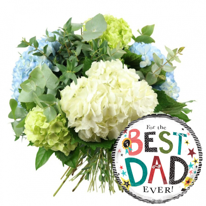 This photograph presents a warm, celebratory Father's Day gift set, composed of a hydrangea bouquet and a fun foil balloon, arranged against a bright white background that makes every shape and shade easy to distinguish. The bouquet, clearly designed by a skilled florist familiar with Mill Hill's love of elegant yet relaxed style, fills the upper left of the frame. It forms a generous, rounded cluster dominated by large heads of creamy white hydrangeas. These central blooms are made up of countless small petals pressed closely together, creating a dense, velvety surface that looks soft to the touch. Around them, light blue hydrangeas curve gently along the left edge and upper part of the bouquet, adding an airy, peaceful feeling, reminiscent of wide skies above the open spaces of Mill Hill Park or the nearby countryside views. Providing a striking contrast, lime green hydrangeas are tucked in at the lower left and upper right, their vivid, fresh tones giving the bouquet a modern, energising lift. Threaded throughout the hydrangeas is a mix of greenery: silvery eucalyptus with its distinctive rounded leaves and deeper green foliage that frames the blooms, adding depth, shadow, and the impression of a subtle, clean scent. The stems emerge at the base in a tidy bundle, green and straight, showing that this is a hand-tied design ready to be delivered to homes around Mill Hill Broadway or along the Ridgeway. To the lower right, overlapping the bouquet, is a shiny, circular foil balloon that adds a playful note. Its centre is a crisp white field, bordered at top and bottom by classic black-and-white stripes that draw attention inward. In the middle, the words For the BEST DAD EVER! are laid out in a mix of fonts and colourful letters-reds, teals, greens, and blacks, some decorated with stripes and polka dots. A small No. 1 rosette badge appears near the word BEST, and the rest of the balloon is dotted with tiny stars and confetti-like circles in yellow, red, teal, and black. Together, the cool hydrangea tones and upbeat balloon create an image of affectionate appreciation, perfect for celebrating a father in Mill Hill on Father's Day, his birthday, or any occasion when his quiet support deserves to be recognised.