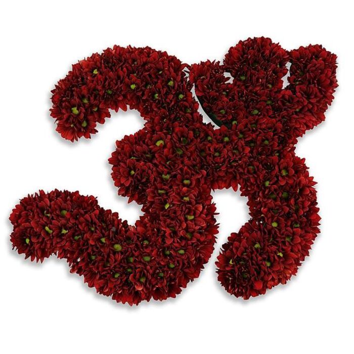 A striking, hand-assembled floral number 33 sits against a pristine white background, its form built from countless small, deep burgundy button chrysanthemums that together create a lush, velvety surface. Each numeral is a mass of tightly packed blooms, their layered petals forming a tactile, almost plush texture, while tiny green centres and flecks of foliage subtly break the red plane and add organic definition to the curves. The overall tone is a warm, wine-hued crimson that reads as both celebratory and dignified; the soft, diffused grey shadow beneath gives the impression of gentle elevation, as if the arrangement breathes slightly above the surface. Up close, you sense the floralist's quiet discipline: blossoms placed to maintain a continuous edge, density balanced to keep the numerals legible from across a room. The scent is faintly floral and earthy - the signature of fresh chrysanthemums - and the aesthetic suggests uses ranging from a joyful 33rd birthday display to a commemorative tribute for a milestone anniversary or memorial service. This is the sort of piece a neighbour might commission for a Mill Hill Village gathering, a presentation at Mill Hill Broadway community events, or to mark a sporting or uniform number at a local club. Prepared with local knowledge and care by Flowers Mill Hill, the composition speaks of neighbourhood occasions and the tactile pleasure of living colour arranged with intent and respect within the familiar streets and halls of the Mill Hill area.