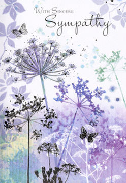 The sympathy card's illustration feels like a soft exhale, a moment of calm reminiscent of looking out across Mill Hill's open spaces on a misty morning. From the lower edge, slender wildflower stems emerge, each one culminating in a delicate umbel that spreads like filigree against a background of cool lavender and powdery blue. The flowers are rendered with an almost transparent touch, their outlines fading at the edges so that they blend gently into the wash of colour behind them. Watercolour tones drift and merge-pale lilac, soft indigo, and hints of silvery green-creating a background that feels more like atmosphere than scenery. Scattered among the blooms, a couple of butterflies float, their wings lightly shaded in the same palette, suggesting movement without disturbing the overall stillness. Light in the scene is diffused, with no strong highlights or deep shadows; instead, everything is bathed in a subdued glow that invites contemplation. The space around the flowers is generous, leaving room for the eye to wander and the mind to rest, much like pausing on a quiet side street off Mill Hill Broadway to gather your thoughts. There is a quiet dignity to the design, rooted in nature's gentle resilience. As local florists familiar with guiding families through moments of loss, we see how this card offers comfort not through bold sentiment, but through a soothing visual language of soft colour, fine detail, and unspoken understanding-a tender way to accompany your message of sympathy.