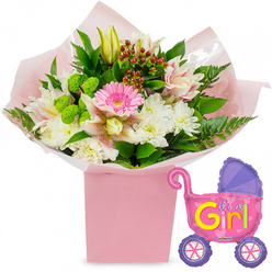Set against a clean white background, this image showcases a tender new baby girl gift that combines fresh flowers with a playful balloon accent. In the middle, a lush bouquet springs from a square, light-pink gift box, its edges softened by folds of blush-pink tissue paper and a protective layer of clear cellophane that glints subtly under the light. The bouquet's focal bloom is a bright, soft-pink gerbera daisy, its open face and perfectly arranged petals giving the impression of a beaming smile. Grouped closely around it, white chrysanthemums with many-fingered petals form cosy, rounded cushions of texture. Threaded between them are refined alstroemeria lilies, their white and gentle pink petals dusted with tiny speckles, adding a touch of elegance. A closed yellow lily bud lifts upward near the top, hinting at the promise of new blossoms, echoing the sense of anticipation that surrounds a newborn. To bring contrast, vivid lime-green button flowers, reminiscent of Santini chrysanthemums, pop out from the arrangement, their compact, spherical heads adding both colour and depth. Tucked between the blooms, clusters of deep red hypericum berries sit against a backdrop of glossy dark-green foliage and airy fern fronds that spill over the box, giving a full and abundant feel. To the right of the bouquet, a metallic foil balloon shaped like an old-fashioned baby stroller completes the scene. Its body shines in a bright, reflective pink, complemented by a curved purple hood and purple wheels with colourful spokes radiating from the centre. Across the balloon, bold letters in yellow and green spell It's a Girl!, with small heart motifs reinforcing the celebration. It feels like a thoughtful gift waiting on a hallway table in a Mill Hill house, ready to be carried to new parents near Arrandene Open Space or along Lawrence Street.