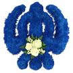 An imposing yet profoundly gentle floral tribute in the form of the Sikh Khanda rests against a flawless white background, radiating a sense of calm strength. The central double-edged sword, the encircling chakkar, and the two curved kirpans are all rendered using a dense covering of small royal blue chrysanthemums. The flowers are tucked closely together so that their overlapping petals form a continuous, velvety surface, free from gaps, giving the impression of a carefully carved emblem softened by nature. The blue is deep and contemplative, suggestive of twilight settling over Mill Hill's open spaces, and conveys dignity, faith, and steadfast remembrance. At the base of the central blade, a smaller, contrasting floral cluster gently softens the design. Three white roses open gracefully, their layered petals catching the light in soft highlights and shadows, while airy white filler flowers nestle between them like tiny stars. These are framed by smooth, dark green leaves that add freshness and a sense of life continuing. Subtle shadows around the arrangement hint at its thickness and three-dimensional form, making it easy to imagine this tribute resting on a stand beside a casket or displayed at a memorial. The overall mood is solemn yet reassuring, a floral expression of Sikh identity and love. It feels like the thoughtful work of a local Mill Hill florist, well-attuned to the needs of families in the area who seek a respectful, meaningful way to honour their loved one through a symbol that carries generations of spiritual significance.
