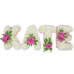 A tender, three-dimensional floral tribute spells the name KATE in bold, freestanding block letters, each letter sculpted from hundreds of small, pristine white chrysanthemums to form a dense, cloud-like surface. The chrysanthemums are packed closely together so the letters read clearly from a distance, their rounded heads creating a soft, tactile texture you can almost feel under the fingertips. A pale pink satin ribbon traces the inner contours of every letter, lending a gentle, feminine outline that catches soft studio light and creates a subtle blush against the white blooms. Strategic clusters of vivid hot pink roses punctuate each letter-two roses on the left arm of the K, a single prominent bloom nestled in the lower curve of the A, one rose anchoring the base of the T, and a pair of roses accenting the right side of the E-each rose set among lush green foliage and delicate pale-pink filler buds such as alstroemeria or spray roses. Varied greenery, from fern-like fronds to glossy ruscus leaves and wisps of spiral grass, peeks through and softens the composition, giving it depth and a fresh, garden-like scent. The letters sit independently with faint shadows beneath, suggesting a freestanding memorial display meant for a chapel, funeral home, or celebration-of-life service. The overall effect is dignified and intimate-white and pink tones that convey reverence, warmth and remembrance-a bespoke sympathy tribute designed to read clearly at a memorial while offering a compassionate, handcrafted farewell from a local Mill Hill florist.