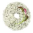 A minimalist yet deeply expressive funeral wreath is pictured lying flat on a bright white background, its form defined by an unbroken ring of white Baby's Breath. The Gypsophila blossoms are so tightly clustered that they give the wreath a plush, cloud-like appearance, each tiny flower contributing to a soft, snowy texture that curves around a completely open centre. This open middle creates a feeling of space and reflection, like a quiet pause held within a circle of light. On the lower right curve of the wreath, two calla lilies add a bold, graceful accent. Their elongated, trumpet-shaped flowers are coloured in rich burgundy and magenta at the fluted tips, gently fading to green as the petals roll back towards the stems. The stems are slim, fresh green lines that disappear elegantly into the cushion of Baby's Breath, curving upwards and inward in a subtle, natural motion. The simple white background and even lighting keep the focus on the contrast between the fine, airy Gypsophila and the sleek, sculptural callas. There are no extra greens or bows to distract from this harmony. The overall effect is serene, dignified, and modern, perfect for a memorial service or funeral in Mill Hill, whether displayed in a chapel, placed beside a coffin, or laid at a graveside. As local florists, we often see families drawn to this kind of design when they want a tribute that is soft and pure, yet marked with a touch of deep colour to represent enduring affection and respect.